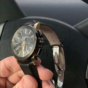 Black and Gold Gucci watch